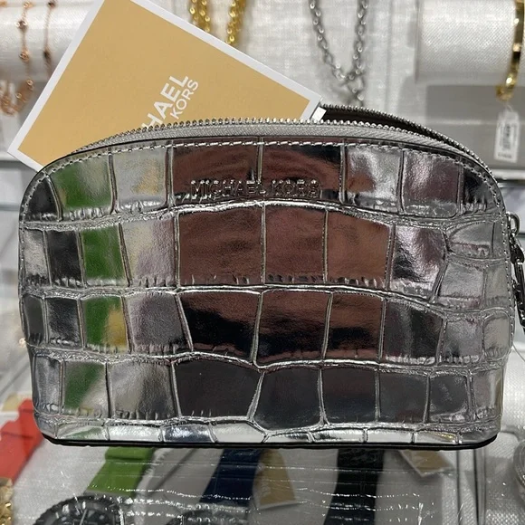 Michael Kors Empire Sm Metallic Crocodile Embossed Leather Travel Pouch
Silver - Picture 12 of 16